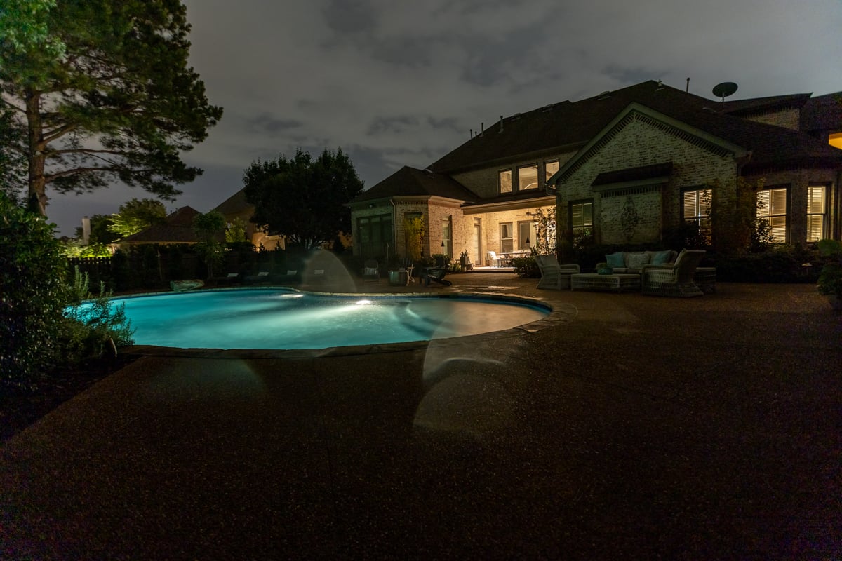 Backyard pool outdoor lighting before