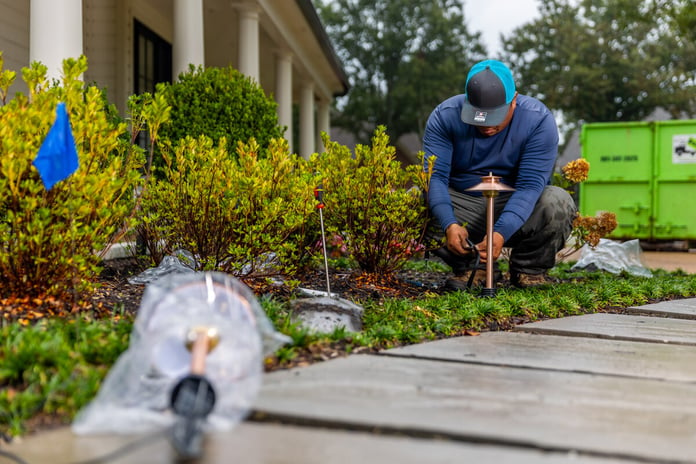 Residential landscape lighting crew installation wiring 1