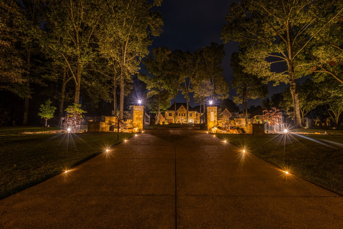 Residential landscape lighting driveway gate tree uplighting 